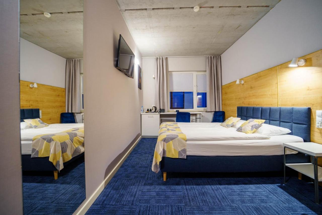 Hotel 107 Rumia Bagian luar foto